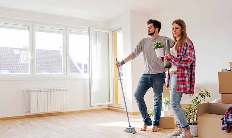young couple inside their new house