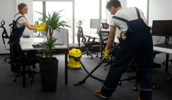 Full shot people cleaning office