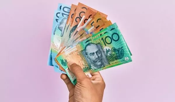 cropped picture of a person with some money